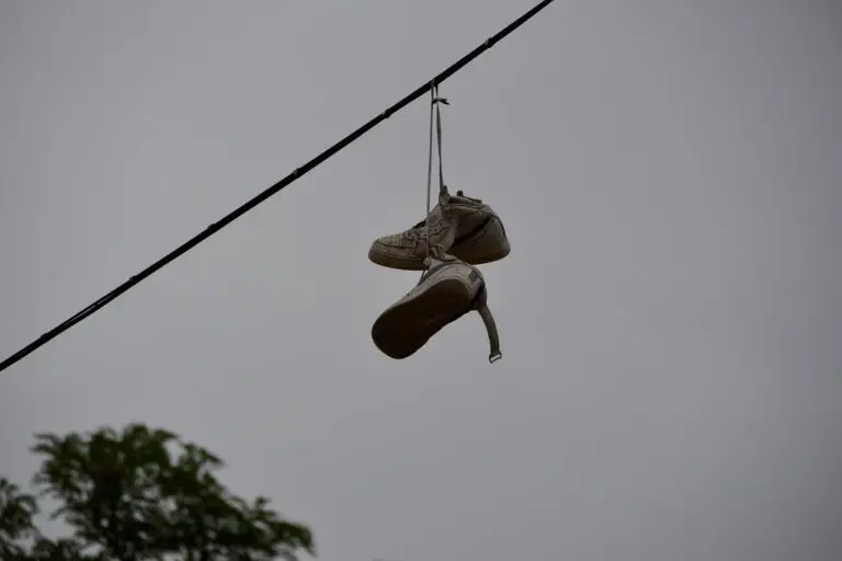 Nike shoes hanging on power line