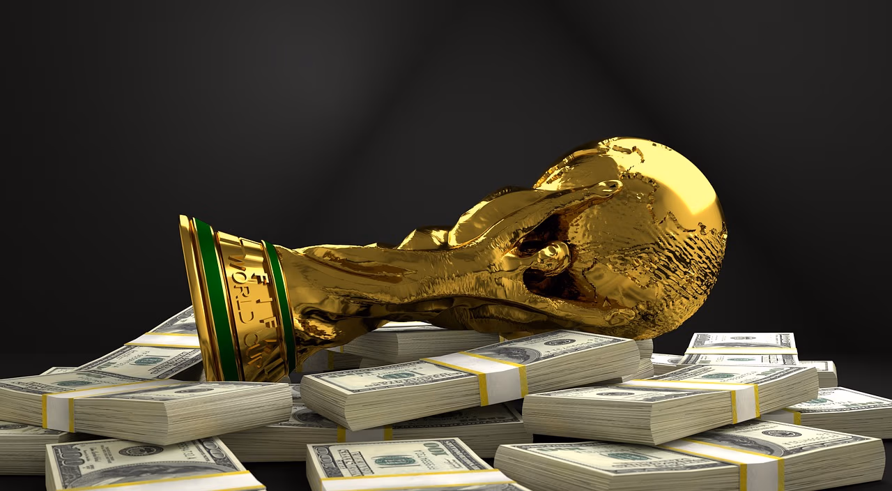 World Cup on pile of cash